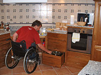 Kitchen: Featuring low work tops for accessibility.